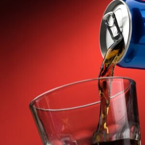 Pouring a soft drink in a glass